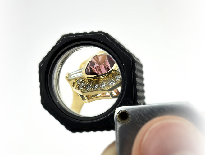 Expert jeweler repairing a gold ring at NOVA Jewelry Design Studio in Vancouver