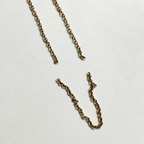 Broken gold chain being repaired at Vancouver jewelry studio Nova